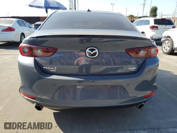 2023 Mazda 3 Premium Plus with VIN 3MZBPBEY5PM374977, listed as a Copart auction lot 70642804 with 9,029 mi miles and Salvage Title. Bid and sale history available at DreamBid. Image 6.