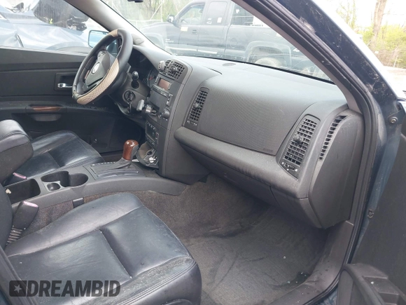 2005 Cadillac CTS with VIN 1G6DP567750145142, listed as a IAAI auction lot 42064222 with 138,127 mi miles and . Bid and sale history available at DreamBid. Image 5.