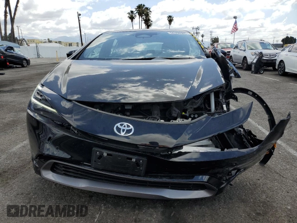 2023 Toyota Prius LE z VIN JTDACAAUXP3005928, wystawiony jako Copart lot #56358905 z przebiegiem 38 417 mil mil oraz Szkoda całkowita • Salvage title. Historia ofert i sprzedaży dostępna na DreamBid. Obrazek 5.