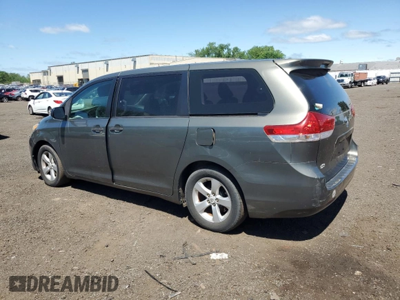 2012 Toyota Sienna with VIN 5TDZK3DC8CS198495, listed as a Copart auction lot 57335205 with 66,786 mi miles and Salvage title. Bid and sale history available at DreamBid. Image 2.