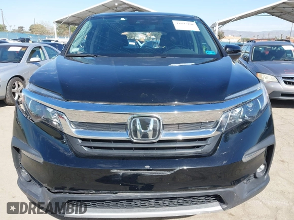 2020 Honda Pilot EX-L with VIN 5FNYF5H54LB009448, listed as a IAAI auction lot 41697106 with 63,310 mi miles. Bid and sale history available at carsss.com. Image 12.