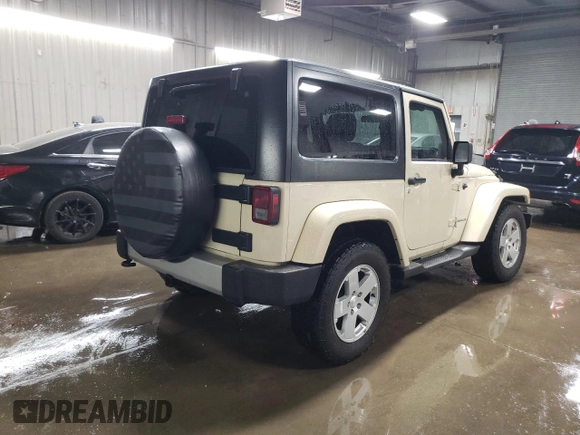 2011 Jeep Wrangler Sahara with VIN 1J4AA5D19BL577347, listed as a Copart auction lot 80340124 with 148,986 mi miles and Salvage Title. Bid and sale history available at DreamBid. Image 3.