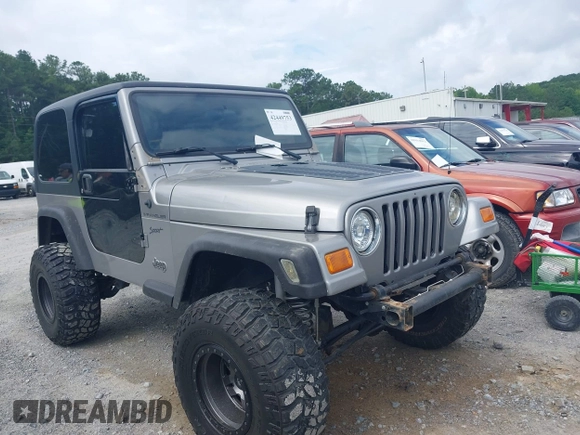 2002 Jeep Wrangler Sport with VIN 1J4FA49S52P717811, listed as a IAAI auction lot 42449753 with 252,258 mi miles and . Bid and sale history available at DreamBid. Image 1.