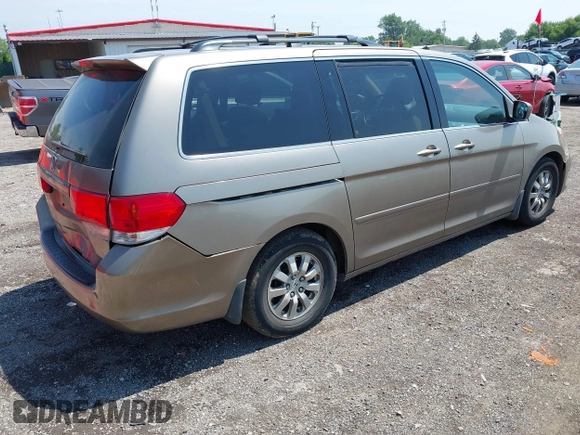 2010 Honda Odyssey EX with VIN 5FNRL3H59AB019293, listed as a IAAI auction lot 42769362 with 256,541 mi miles and . Bid and sale history available at DreamBid. Image 4.