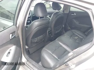 2014 Kia Optima SXL Turbo with VIN 5XXGR4A69EG312273, listed as a IAAI auction lot 41729863 with 107,660 mi miles and . Bid and sale history available at DreamBid. Image 8.