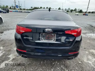 2013 Kia Optima EX z VIN 5XXGN4A79DG162815, wystawiony jako Copart lot #59282275 z przebiegiem 163 920 mil mil oraz Szkoda całkowita • Salvage title. Historia ofert i sprzedaży dostępna na DreamBid. Obrazek 6.