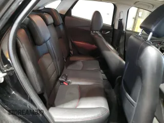 2017 Mazda CX-3 Grand Touring z VIN JM1DKFD71H0141595, wystawiony jako Copart lot #54377305 z przebiegiem 60 907 mil mil oraz Szkody całkowita. Historia ofert i sprzedaży dostępna na DreamBid. Obrazek 11.