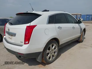 2013 Cadillac SRX Performance Collection z VIN 3GYFNDE30DS648288, wystawiony jako IAAI lot #41955462 z przebiegiem 135 956 mil mil oraz . Historia ofert i sprzedaży dostępna na DreamBid. Obrazek 4.