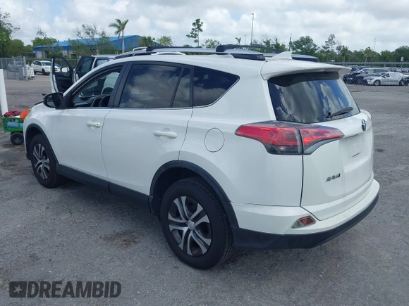 2016 Toyota RAV4 LE with VIN JTMZFREV2GJ096782, listed as a IAAI auction lot 41945319 with 76,866 mi miles. Bid and sale history available at carsss.com. Image 3.