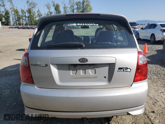 2005 Kia Spectra with VIN KNAFE161355121968, listed as a Copart auction lot 54621465 with 221,951 mi miles and Clean Title. Bid and sale history available at carsss.com. Image 6.
