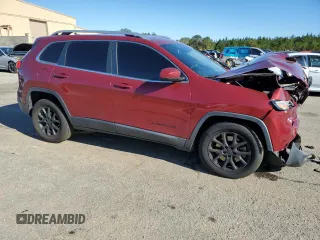 2015 Jeep Cherokee Latitude with VIN 1C4PJLCB5FW695592, listed as a Copart auction lot 50297695 with 108,091 mi miles and Salvage Title. Bid and sale history available at DreamBid. Image 4.