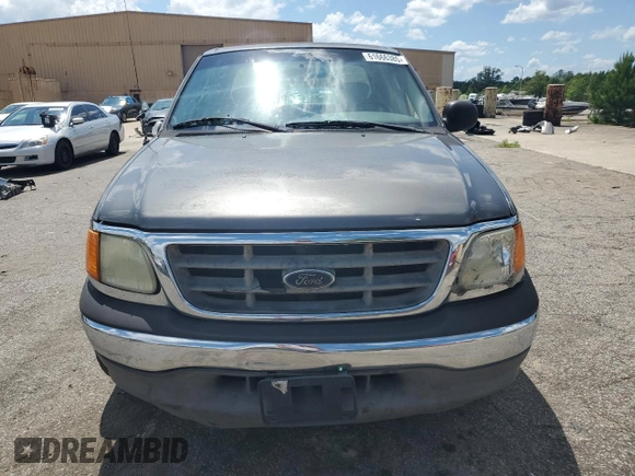 2004 Ford F-150 XL with VIN 2FTRX17W54CA32203, listed as a Copart auction lot 61666385 with Not provided miles and Salvage title. Bid and sale history available at DreamBid. Image 5.