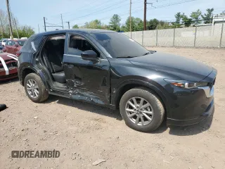 2024 Mazda CX-5 S Carbon Edition z VIN JM3KFBCL8R0489292, wystawiony jako Copart lot #55098625 z przebiegiem 11 132 mil mil oraz Szkoda całkowita • Salvage title. Historia ofert i sprzedaży dostępna na DreamBid. Obrazek 4.