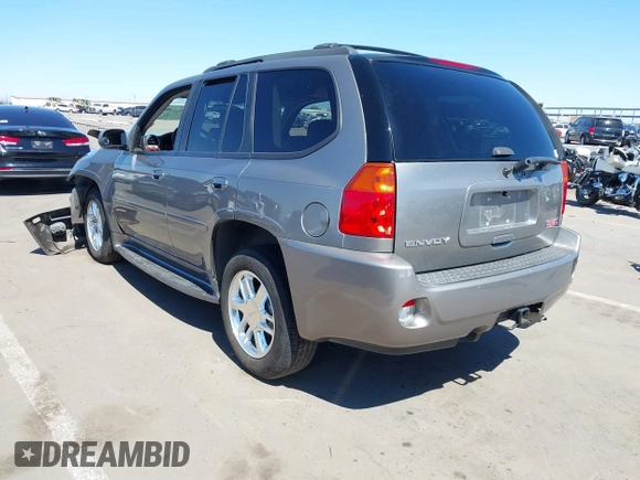 2008 GMC Envoy Denali with VIN 1GKET63M082201867, listed as a IAAI auction lot 41874803 with 218,639 mi miles. Bid and sale history available at carsss.com. Image 3.