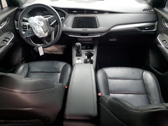 2020 Cadillac XT4 AWD Premium Luxury z VIN 1GYFZDR41LF025434, wystawiony jako Copart lot #55169805 z przebiegiem Nie podano mil oraz Szkoda całkowita • Salvage title. Historia ofert i sprzedaży dostępna na DreamBid. Obrazek 8.