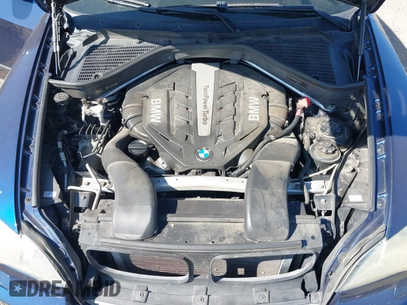 2012 BMW X5 50i with VIN 5UXZV8C57CL423223, listed as a IAAI auction lot 42606594 with 94,695 mi miles and . Bid and sale history available at DreamBid. Image 10.