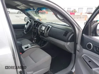2014 Toyota Tacoma PreRunner with VIN 5TFJU4GN7EX058283, listed as a IAAI auction lot 41797328 with 101,811 mi miles. Bid and sale history available at carsss.com. Image 5.
