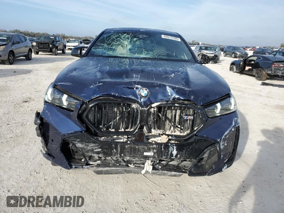 2025 BMW X6 M60i with VIN 5UX43EX01S9X19069, listed as a Copart auction lot 42613105 with 6,909 mi miles and Salvage Title. Bid and sale history available at carsss.com. Image 5.