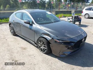 2022 Mazda Mazda3 Hatchback Premium with VIN JM1BPAML9N1518186, listed as a IAAI auction lot 42074112 with 23,722 mi miles. Bid and sale history available at carsss.com. Image 1.