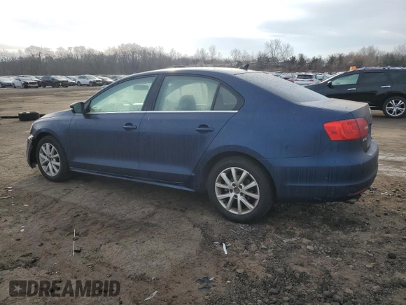 2014 Volkswagen Jetta SE с VIN 3VWD17AJ9EM400347, выставлен на аукционе Copart как лот 88554635 с пробегом 128 373 миль миль и Списание • Salvage title. История ставок и продаж доступна на DreamBid. Изображение 2.