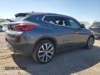 2020 BMW X2 sDrive28i z VIN WBXYH9C07L5P73232, wystawiony jako Copart lot #51948905 z przebiegiem Nie podano mil oraz Szkoda całkowita • Salvage title. Historia ofert i sprzedaży dostępna na DreamBid. Obrazek 3.