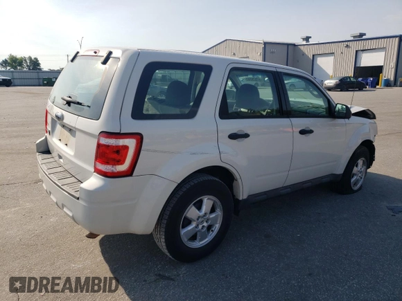 2010 Ford Escape XLS with VIN 1FMCU0C76AKB82752, listed as a Copart auction lot 57626565 with 194,931 mi miles and Salvage title. Bid and sale history available at DreamBid. Image 3.