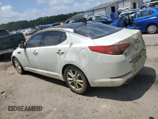 2013 Kia Optima EX z VIN 5XXGN4A72DG237404, wystawiony jako Copart lot #61293445 z przebiegiem 166 327 mil mil oraz Czysty tytuł • Clean title. Historia ofert i sprzedaży dostępna na DreamBid. Obrazek 2.