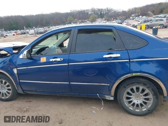 2009 Ford Focus SE z VIN 1FAHP35N59W232162, wystawiony jako IAAI lot #40884449 z przebiegiem Nie podano mil oraz . Historia ofert i sprzedaży dostępna na DreamBid. Obrazek 13.