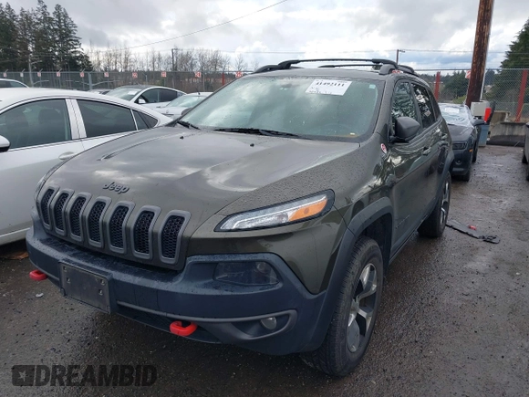 2015 Jeep Cherokee Trailhawk with VIN 1C4PJMBB5FW510514, listed as a IAAI auction lot 41492111 with 98,482 mi miles and . Bid and sale history available at DreamBid. Image 19.