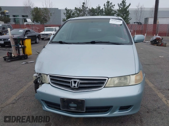 2003 Honda Odyssey EX-L with VIN 5FNRL18943B138444, listed as a IAAI auction lot 41498605 with 153,947 mi miles and . Bid and sale history available at DreamBid. Image 13.