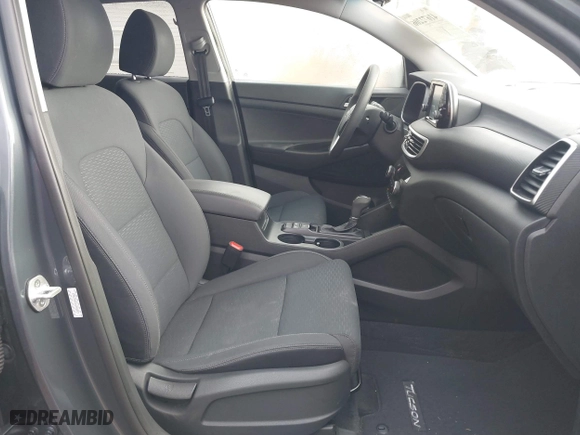 2019 Hyundai Tucson Value with VIN KM8J33A44KU995257, listed as a IAAI auction lot 41672206 with 63,090 mi miles. Bid and sale history available at carsss.com. Image 5.