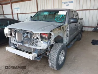 2014 Toyota Tacoma with VIN 3TMLU4EN3EM162738, listed as a IAAI auction lot 41871226 with 135,318 mi miles and . Bid and sale history available at DreamBid. Image 18.