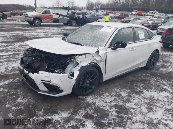 2023 Honda Civic Sport z VIN 19XFL2H89PE008381, wystawiony jako IAAI lot #41443683 z przebiegiem Nie podano mil oraz . Historia ofert i sprzedaży dostępna na DreamBid. Obrazek 17.