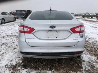 2015 Ford Fusion SE with VIN 3FA6P0HD8FR257984, listed as a Copart auction lot 83854044 with 127,600 mi miles and Salvage Title. Bid and sale history available at DreamBid. Image 6.