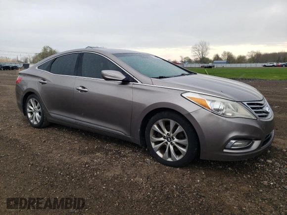 2013 Hyundai Azera z VIN KMHFG4JG7DA216478, wystawiony jako Copart lot #53998885 z przebiegiem 154 277 mil mil oraz Czysty tytuł • Clean title. Historia ofert i sprzedaży dostępna na DreamBid. Obrazek 4.