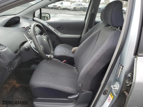 2009 Toyota Yaris with VIN JTDKT903095238977, listed as a Copart auction lot 46437355 with 181,452 mi miles and Salvage Title. Bid and sale history available at carsss.com. Image 7.