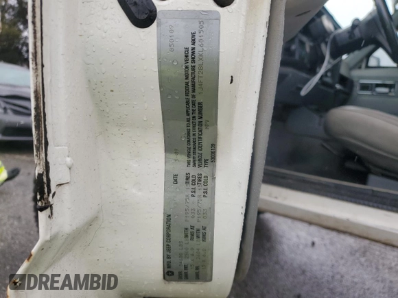 1989 Jeep Cherokee z VIN 1J4FT28LXKL601505, wystawiony jako Copart lot #49312265 z przebiegiem 264 769 mil mil oraz Szkoda całkowita • Salvage title. Historia ofert i sprzedaży dostępna na DreamBid. Obrazek 13.