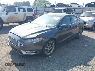 2018 Ford Fusion SE with VIN 3FA6P0HD2JR253714, listed as a IAAI auction lot 42059879 with 115,995 mi miles and . Bid and sale history available at DreamBid. Image 2.