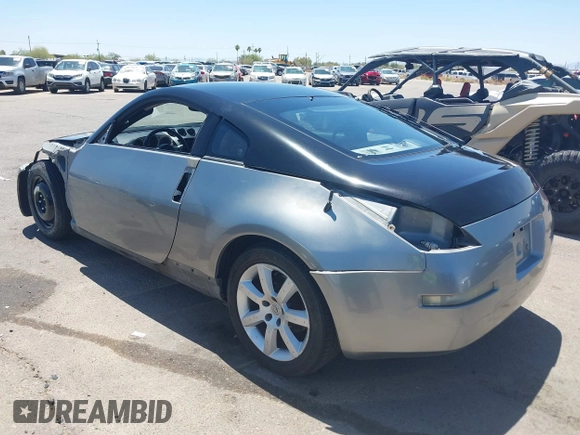 2004 Nissan 350Z Enthusiast z VIN JN1AZ34D74T164233, wystawiony jako IAAI lot #42509421 z przebiegiem 90 780 mil mil oraz . Historia ofert i sprzedaży dostępna na DreamBid. Obrazek 3.