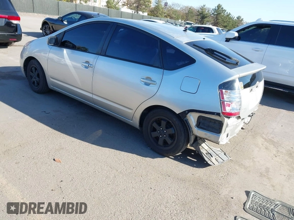 2005 Toyota Prius z VIN JTDKB20UX53080527, wystawiony jako IAAI lot #41831153 z przebiegiem 256 327 mil mil oraz . Historia ofert i sprzedaży dostępna na DreamBid. Obrazek 3.