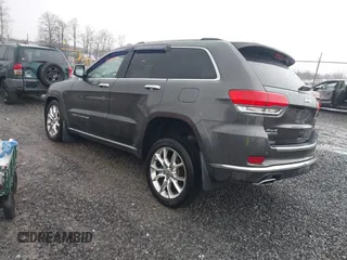 2015 Jeep Grand Cherokee Summit with VIN 1C4RJFJM6FC955904, listed as a IAAI auction lot 41483446 with 65,970 mi miles. Bid and sale history available at carsss.com. Image 3.