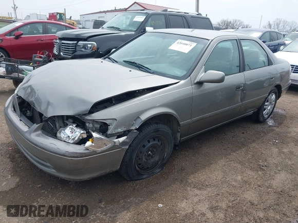 2001 Toyota Camry CE with VIN 4T1BG22K01U060588, listed as a IAAI auction lot 42040071 with 165,446 mi miles and . Bid and sale history available at DreamBid. Image 2.