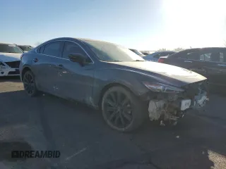 2021 Mazda 6 Carbon Edition with VIN JM1GL1WY0M1610974, listed as a Copart auction lot 84961604 with 55,107 mi miles and Salvage Title. Bid and sale history available at DreamBid. Image 4.