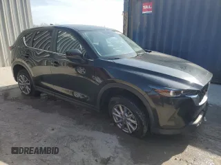 2023 Mazda CX-5 S Carbon Edition z VIN JM3KFBCM2P0192931, wystawiony jako Copart lot #54020595 z przebiegiem 45 658 mil mil oraz Szkody całkowita. Historia ofert i sprzedaży dostępna na DreamBid. Obrazek 4.