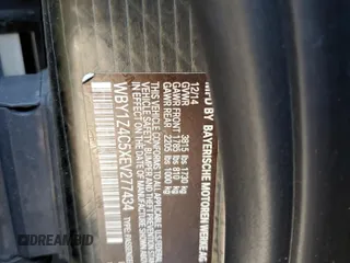 2014 BMW i3 with VIN WBY1Z4C5XEV277434, listed as a Copart auction lot 65808945 with 95,247 mi miles and Clean title. Bid and sale history available at DreamBid. Image 12.