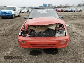 1993 Geo Metro z VIN JG1MR3361PK206010, wystawiony jako Copart lot #49110935 z przebiegiem 31 043 mil mil oraz Szkoda całkowita • Salvage title. Historia ofert i sprzedaży dostępna na DreamBid. Obrazek 5.