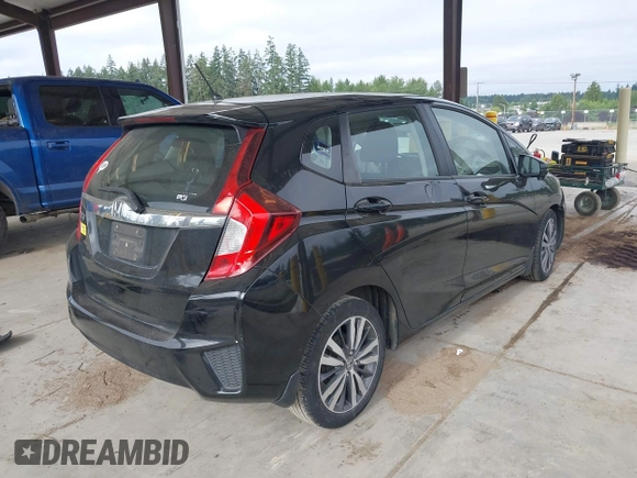 2015 Honda Fit EX-L z VIN 3HGGK5H81FM701122, wystawiony jako IAAI lot #42610165 z przebiegiem 74 969 mil mil oraz . Historia ofert i sprzedaży dostępna na DreamBid. Obrazek 4.