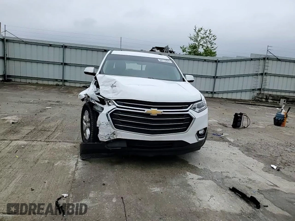 2020 Chevrolet Traverse LT Cloth z VIN 1GNERGKW7LJ317236, wystawiony jako Copart lot #58713465 z przebiegiem 79 070 mil mil oraz Szkoda całkowita • Salvage title. Historia ofert i sprzedaży dostępna na DreamBid. Obrazek 14.
