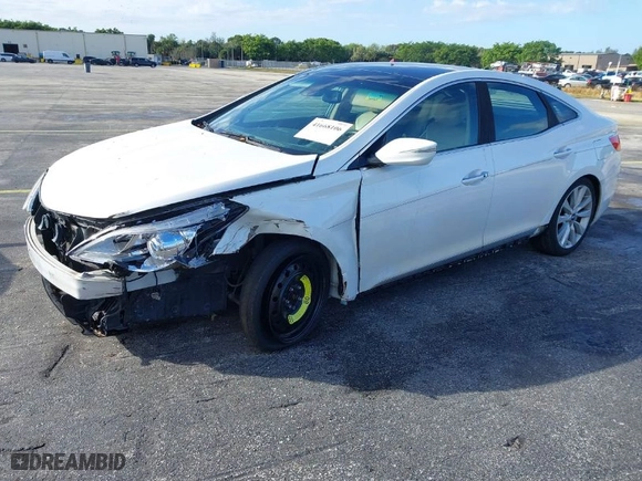 2015 Hyundai Azera Limited with VIN KMHFH4JGXFA474784, listed as a IAAI auction lot 41668106 with 126,709 mi miles. Bid and sale history available at carsss.com. Image 2.