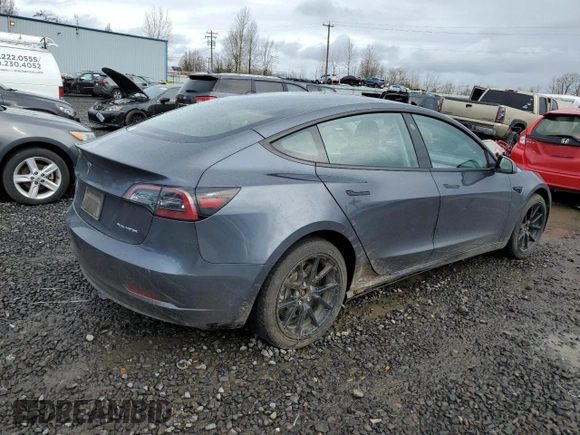 2023 Tesla Model 3 Long Range with VIN 5YJ3E1EB6PF686927, listed as a Copart auction lot 45602285 with 46,534 mi miles and Salvage Title. Bid and sale history available at DreamBid. Image 3.
